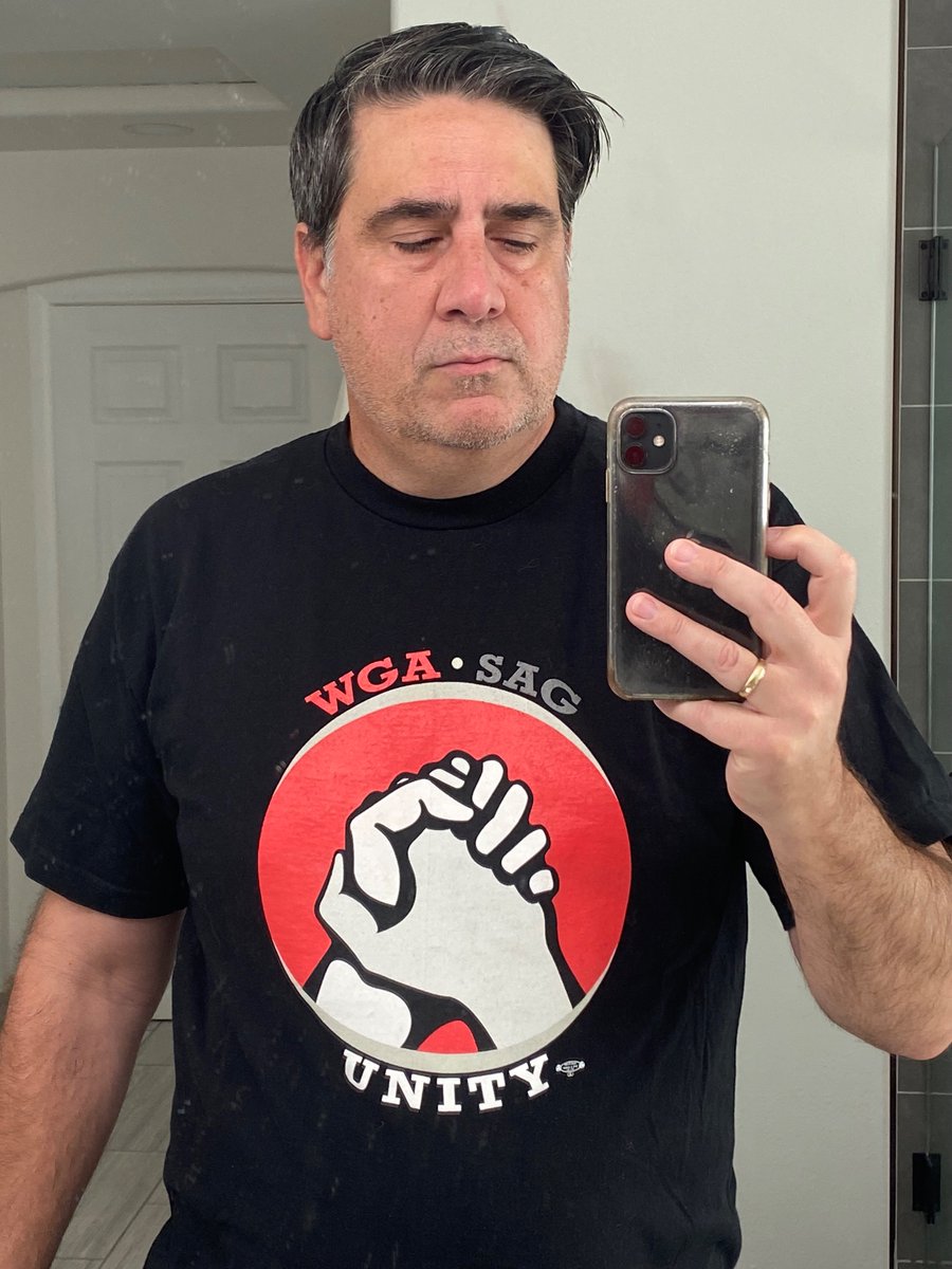 shannonandswift's tweet image. This shirt is from the ‘07 strike. Today, it has new meaning. What SAG is doing is brave and necessary, and the WGA stands with you in solidarity.