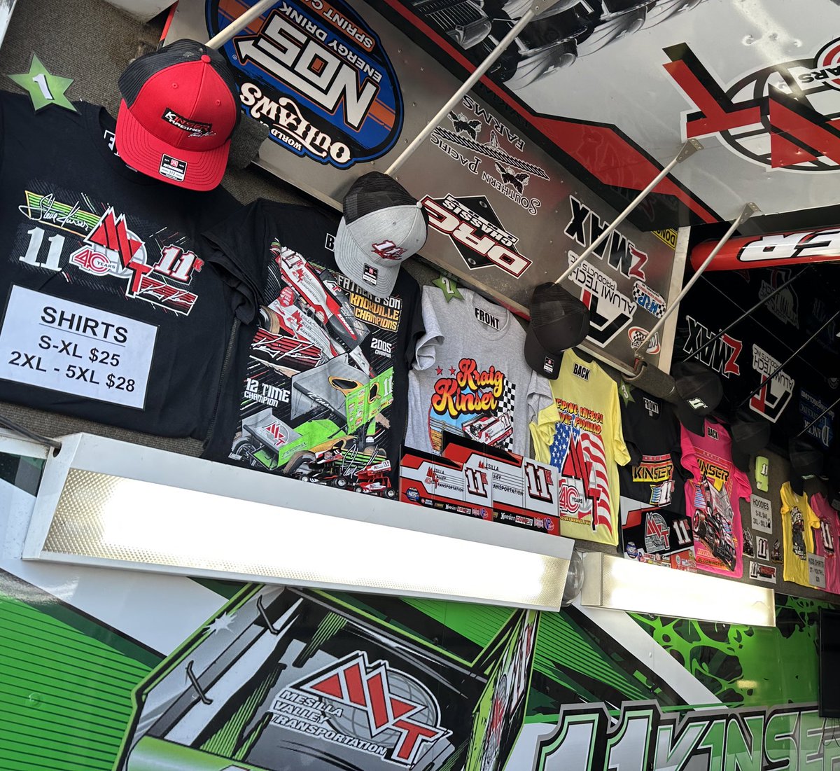 Looking for our merch? Swing by our race hauler here at Eldora and check out our shirts, hats, hoodies, small sideboards and decals.