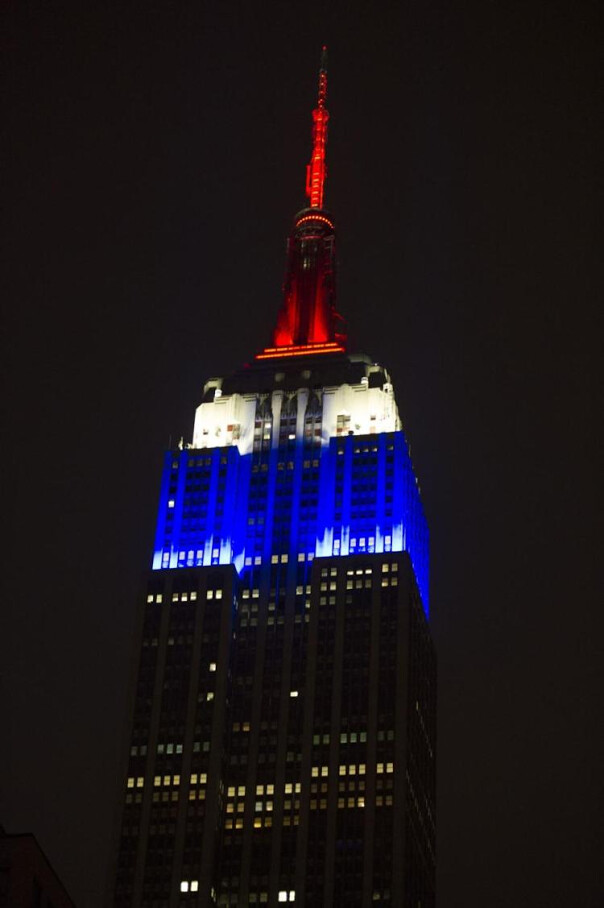 EmpireStateBldg's tweet photo. Shining in Blue, White, and Red tonight in honor of Bastille Day https://t.co/ygTwVWlTIR