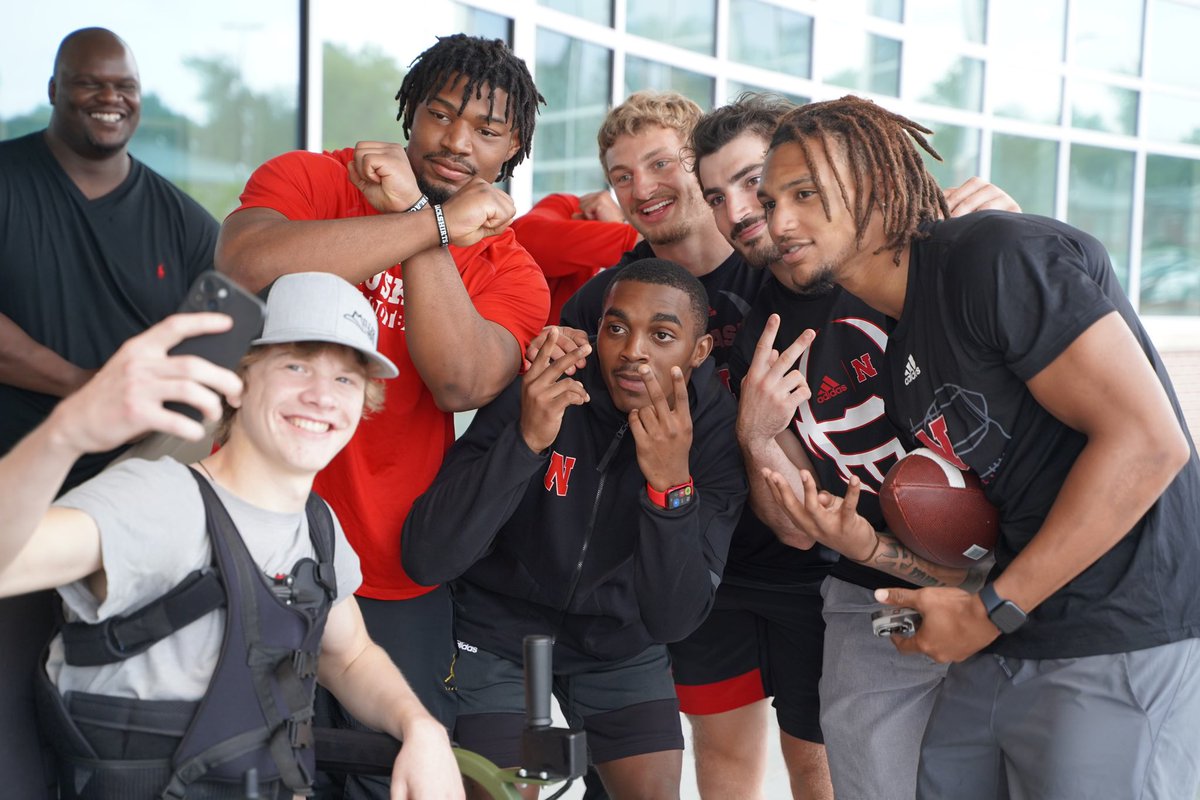 HuskerFootball's tweet photo. "Extending a compassionate heart and being a beacon of hope for those on the journey to recovery." - @CoachFelder 

#GBR x @Madonnarehab https://t.co/Ni2LmYADLz