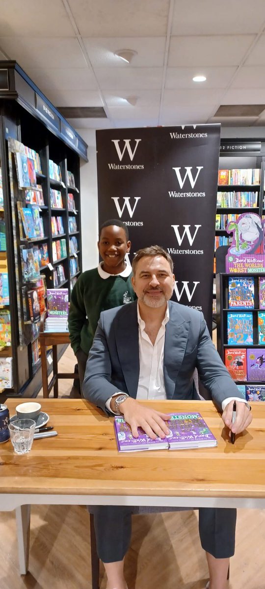DixonsMP's tweet photo. One of our DMP superstars met @davidwalliams at his book signing today, he kindly gifted us a signed book for our school library! We would love for you to come and read it to us David. Thank you. #enjoyment https://t.co/o49NBRtx0v