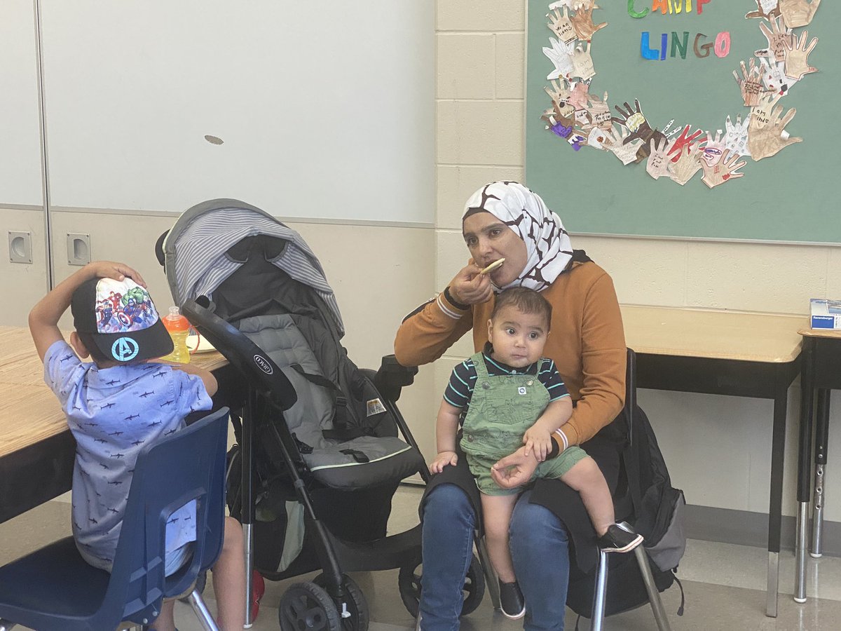 Georgina_JT's tweet photo. Family engagement a wonderful way of sharing the learning. Reading and making self to text connections at #camplingo @gecdsbpro @clarahowitt #gecdsbslp2023 @begleyslp2023 https://t.co/MmuBZPbScw