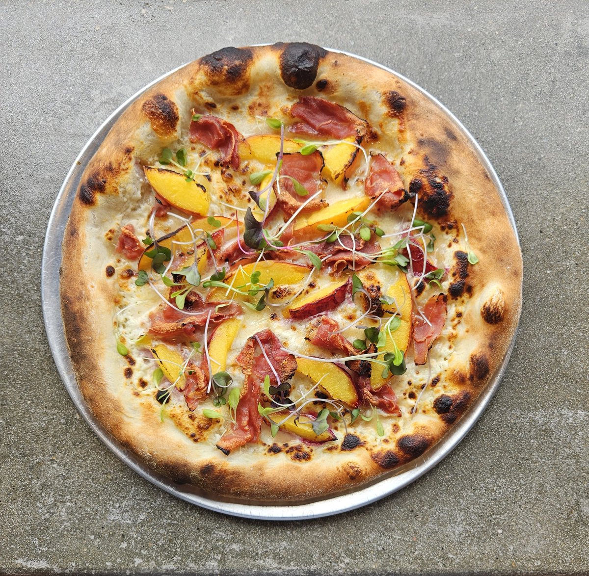 Tis the season! Peach and prosciutto pizza is back on the menu at R5.