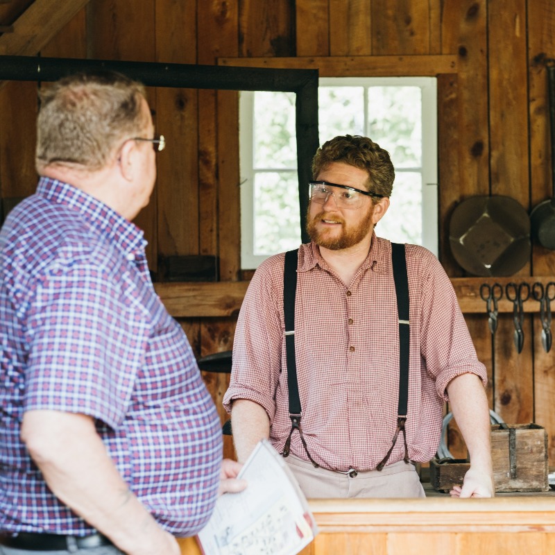Here are the special activities you won't want to miss for Friday, July 21:
* Tinsmith working in the Tinsmith Shop at 10:00 am
* Lighting the forge in the Blacksmith Shop at 10:30 am
* Schoolyard games at 12:30 pm
* Watering the gardens at the Fife Cabin at 2:00 pm