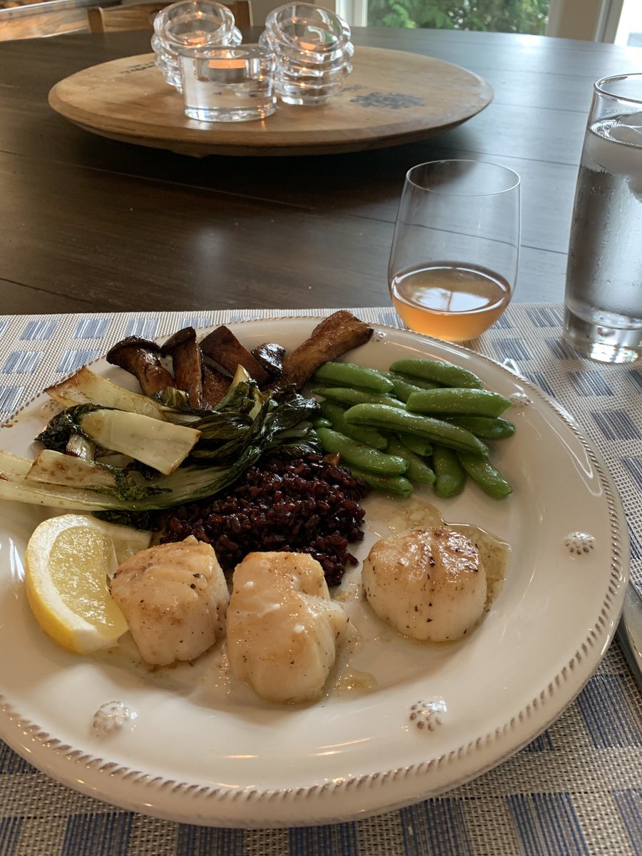 Sautéed diver scallops tonight! Accompanied by bok choy, oyster mushrooms, sugar snap peas and black rice. In my glass? Pinot gris, orange skin from Left Foot Charley winery. #twittersupperclub. #inmyglass