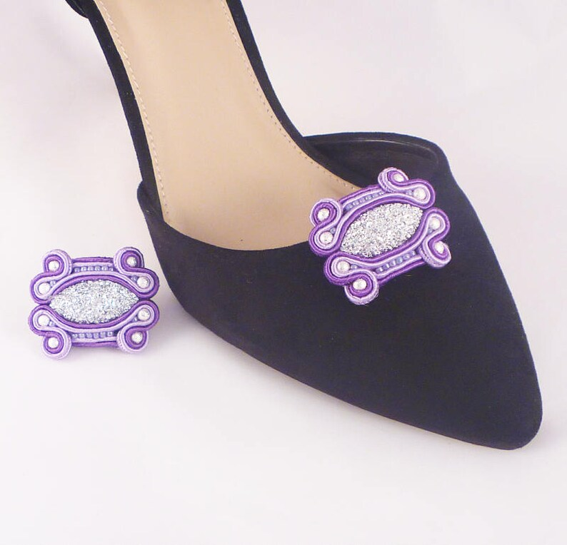 Adiencrafts's tweet photo. What a fabulous idea! From @MollyGDesigns  Soutache Shoe Clips. Removable Shoe Clips. Purple Shoe - Etsy UK https://t.co/9F95jHisab #etsy #tbchboosters #handmade #accessories https://t.co/s5xH8zk5n5