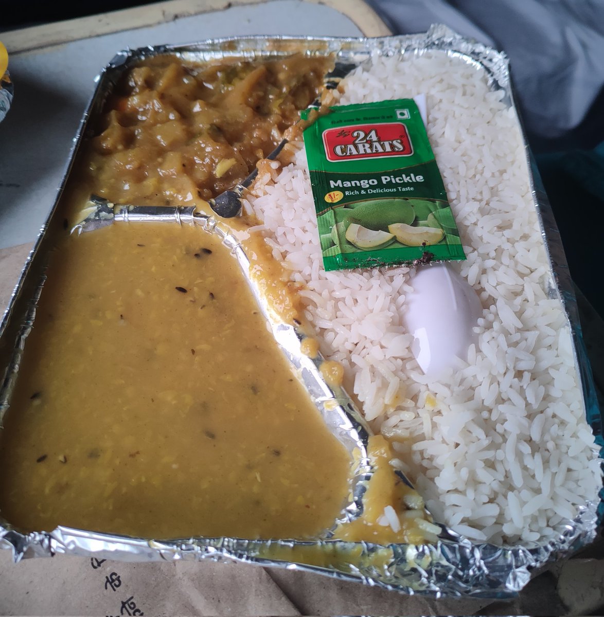 biswarupamlive's tweet photo. IRCTC Veg Meal (80) &amp; Egg Meal (90) provided us today with Rotten Extra Pack Rice, asked but didn't change by staff. This is the condition of food service in 12508 Train 3A. No menu wise food is maintained, rotten rice, and ₹20 for Railneer, what would you do? @RailwaySeva https://t.co/ydmj0cH2JQ