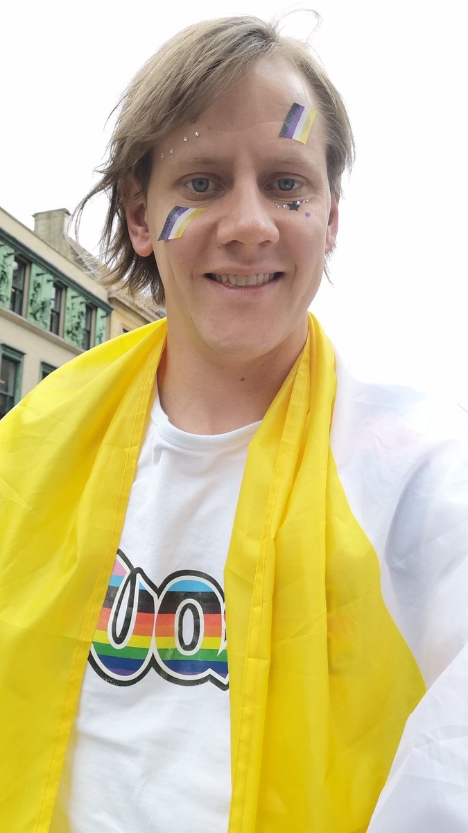 TheAutisticRN's tweet photo. @MardiGla attending my first pride event today flying the #nonbinary flag. https://t.co/ec16gSqQIc