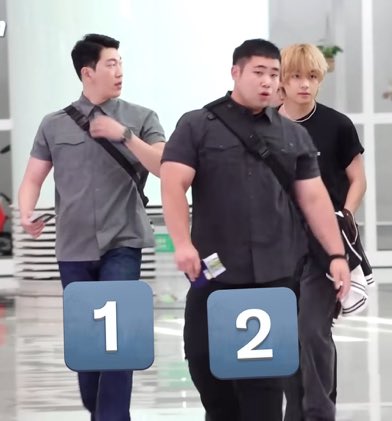 taeteluv_'s tweet photo. taehyung made his bodyguards wear matching hoodies and hair bands and holds them by each arm😭 https://t.co/7ySITbYUK6
