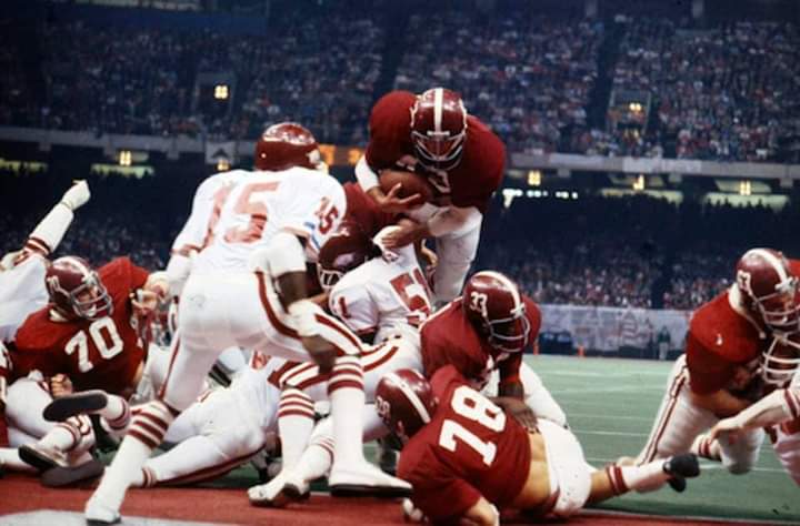 TheWBBFilm's tweet photo. MVP Major Ogilvie dives over the goal line for the TD in the 1980 Sugar Bowl against Arkansas. The TIDE defeats the Razorbacks 24-9 winning the third national championship during the Wishbone era. The Wishbone Boys DVD, Book and golf tournament https://t.co/wwu5Fku86c https://t.co/SQB826y3nm