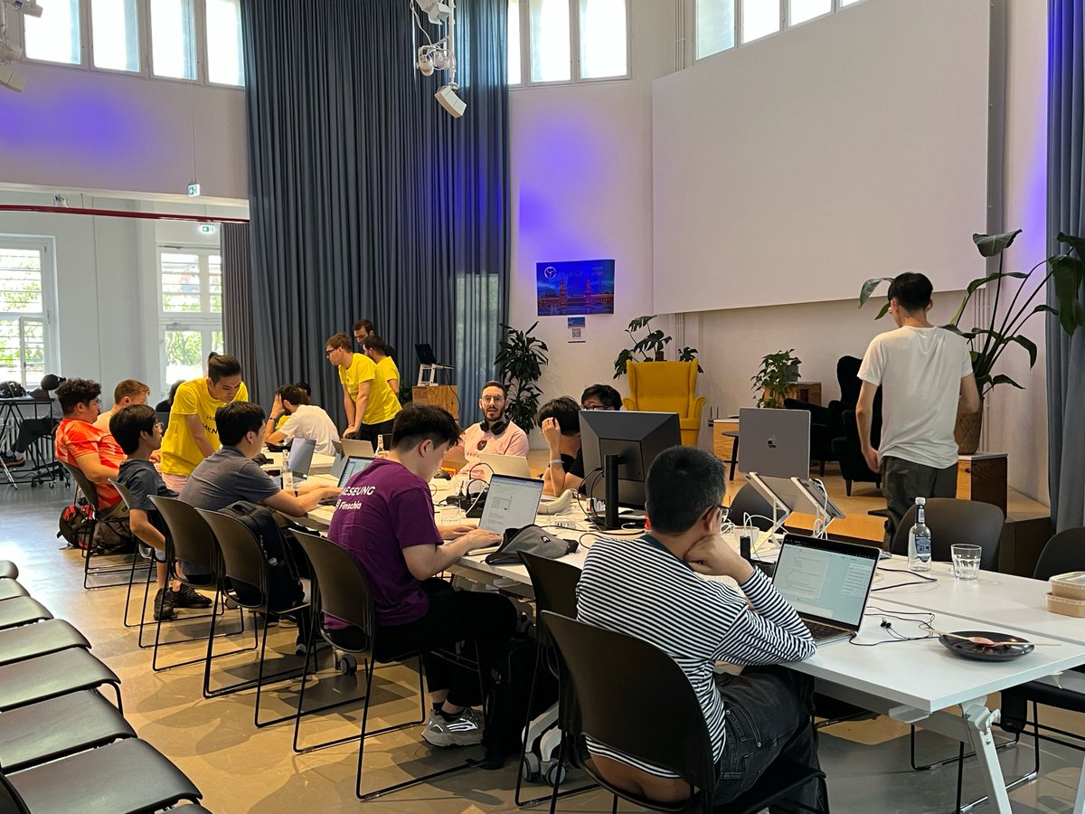 finschia's tweet photo. Day 2 of #HackWasm2023 in Berlin has come to an end! Remember, teams must submit their projects by 12pm tomorrow. As our esteemed judge, Jayden prepares to evaluate your work, the anticipation builds. Who will be victorious in this hackathon? Stay tuned!🤓 #Finschia #CosmWasm https://t.co/RnUlCIdamL