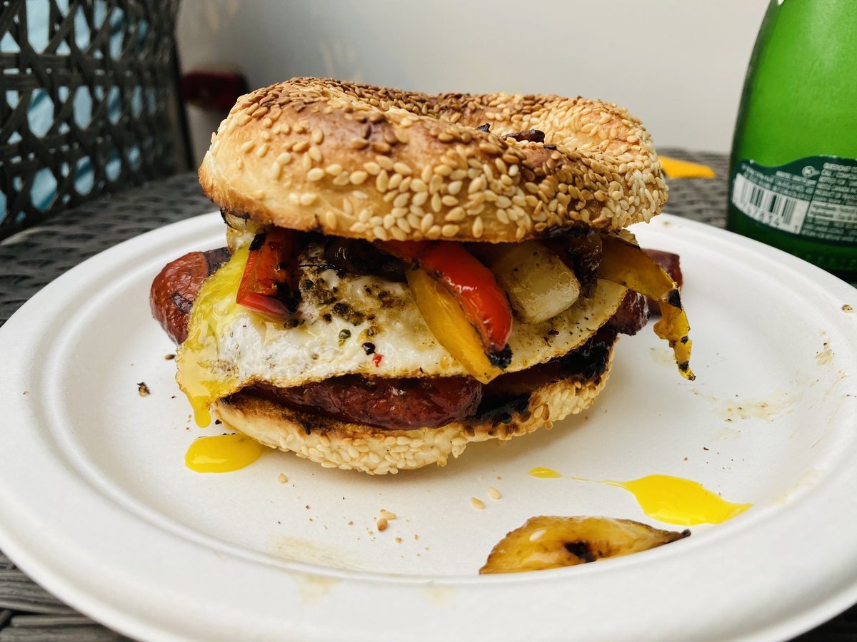 WillyGSkinner's tweet photo. Breakfast bagel.  

Smoked Italian sausage, grilled bell peppers &amp; onions, fried egg and bell pepper relish served on @stviateurbagel .

#BBQ #Smoker #ABPork https://t.co/3NK7AOotCi