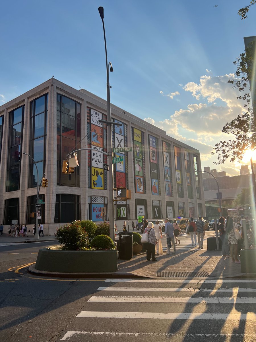 #pafpicoftheweek | Public Art Fund staff member <a href="/rosa/">Rosa</a>.jpg snapped this glowing shot of <a href="/ninachanel/">Nina Chanel Abney</a>’s “San Juan Heal.” Go for sunny stroll today and catch a view of this colorful addition to the 65th street facade @lincolncenter. #RerouteForArt