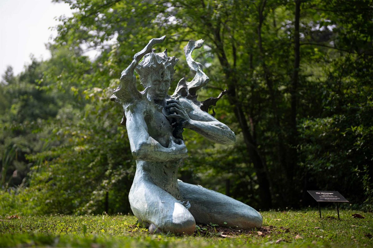 UVA's tweet photo. The sculpture “The Messenger” by Gabe Allan sits tucked away by the UVA Bookstore. It is often overlooked, but for some it is a favorite piece of art on Grounds. https://t.co/FayNADeI24 https://t.co/f674GHU7c7