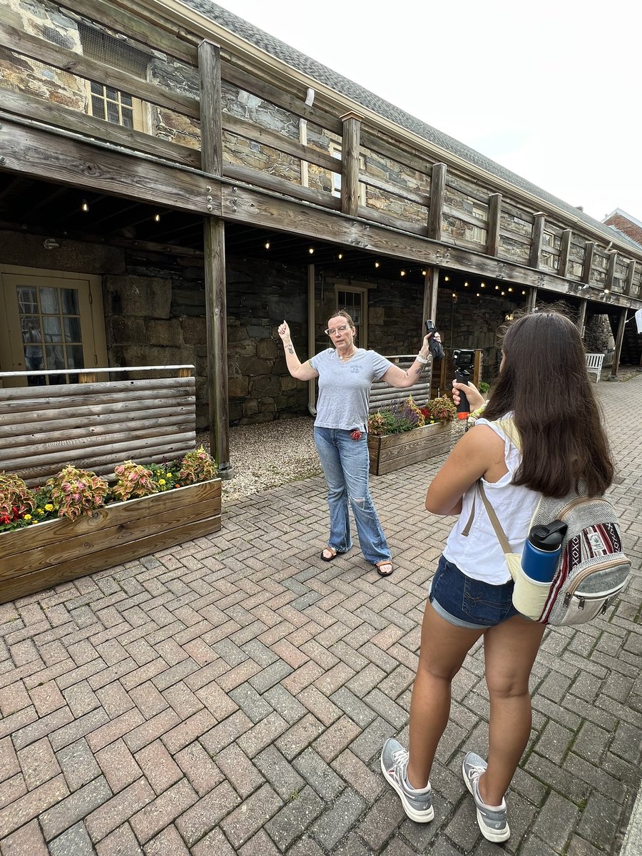 ChrisVaccaro's tweet photo. Field work: Student-journalists in the @spj_tweets Northeast Journalism Institute spent time with @myrwu History Professor Autumn Quezada-Grant news gathering and interviewing about the impact of the slave trade in Bristol, #RhodeIsland. #SPJHSSummer https://t.co/3ta8ZVGTHB