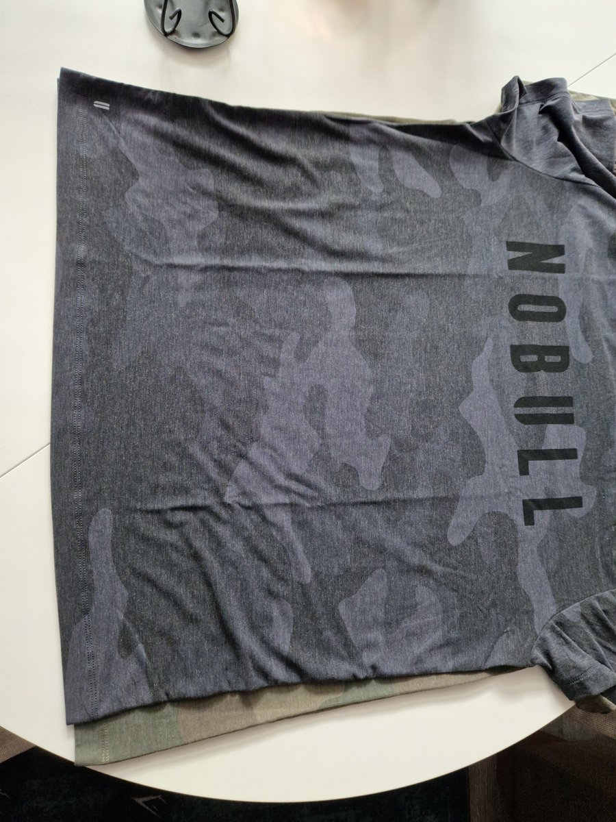 baldywaldo's tweet photo. @nobull these tees are both the same size. The green camo is the stated 79% polyester blend from your website, the grey a 74% polyester blend! Bit of a difference in size eh?! https://t.co/g6d0OyFG3H
