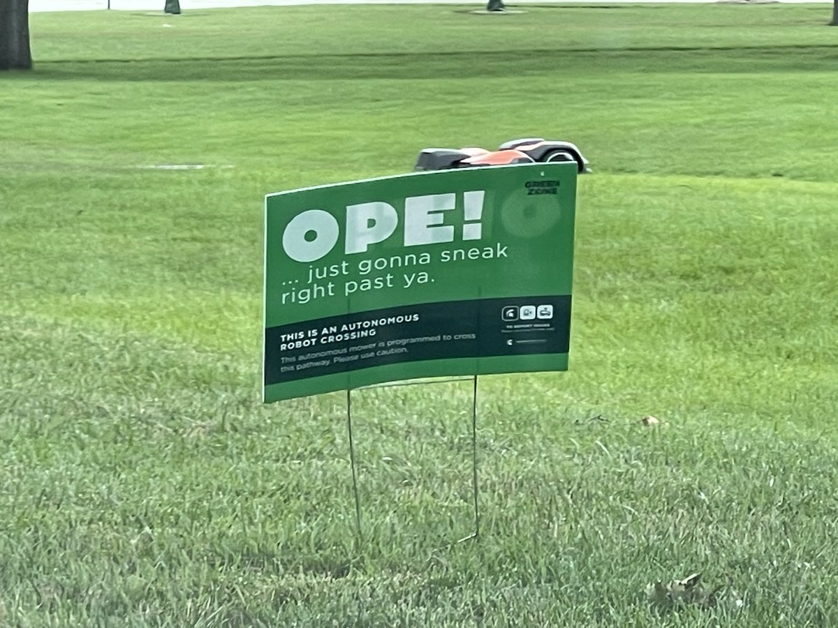 I wonder if the folks at @LansingMIFacts have seen the autonomous lawn mower robot signs at @michiganstateu