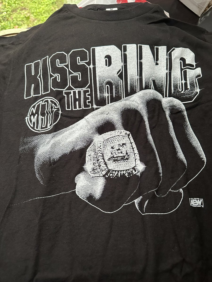 notthatmccoy's tweet photo. I’m not sure what happened with the box itself (like someone tore it open and taped it back up), but anyway, here is a peek at some of the items in this All Elite Crate. #aew #aewcrate @aew https://t.co/2vo052nFUU
