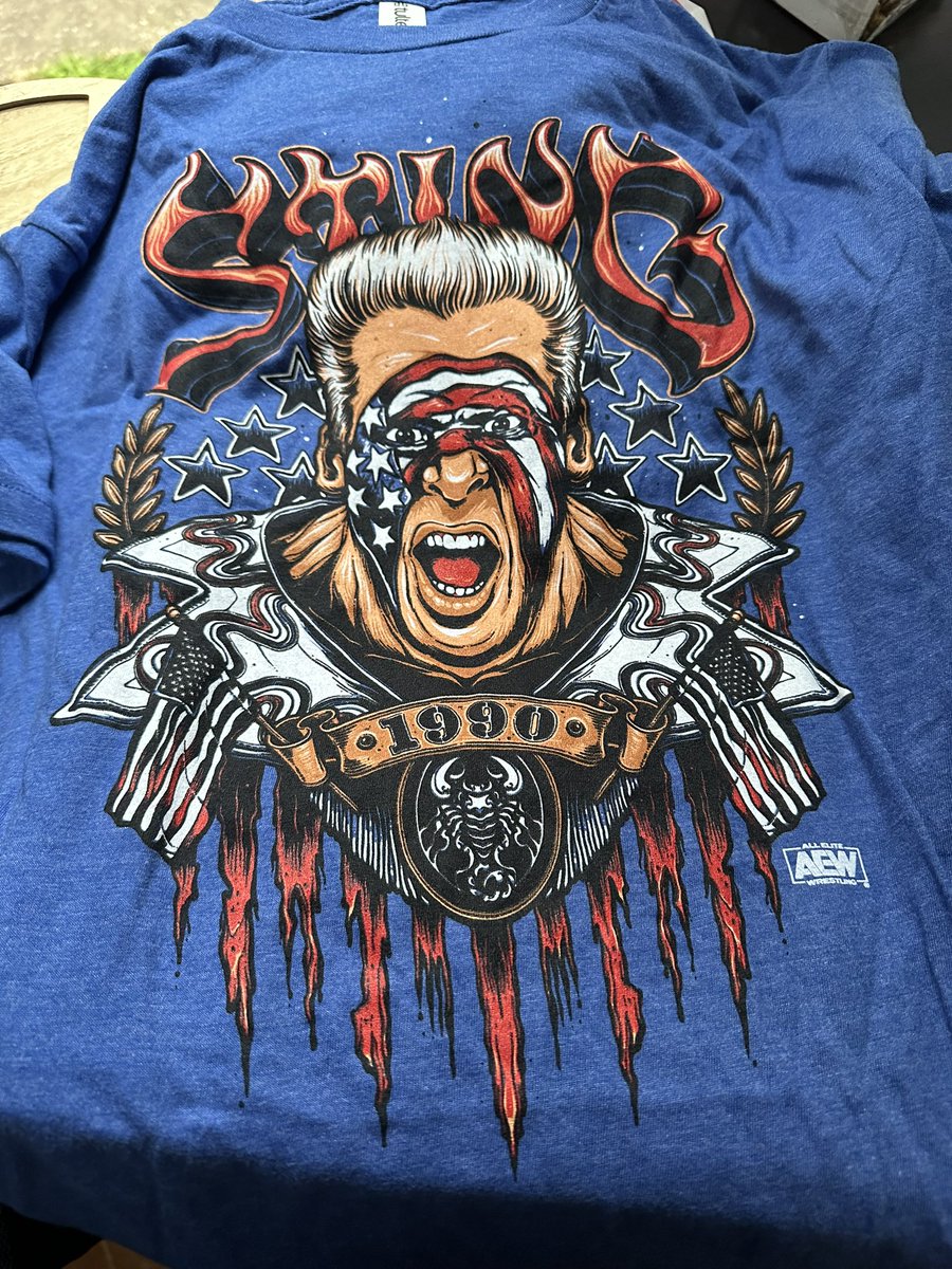 notthatmccoy's tweet photo. I’m not sure what happened with the box itself (like someone tore it open and taped it back up), but anyway, here is a peek at some of the items in this All Elite Crate. #aew #aewcrate @aew https://t.co/2vo052nFUU