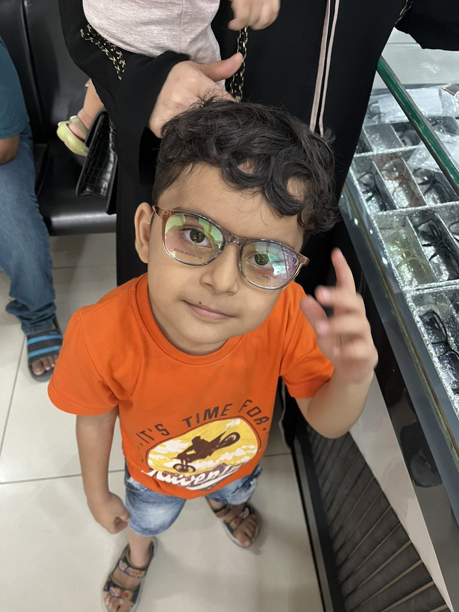 '👓 Exciting moment! My adorable 5-year-old brother just got his first pair of glasses! 🤓 Let's raise awareness and remind everyone not to encourage excessive smartphone use in kids. Protect those precious little eyes! #EyeHealth #LimitScreenTime'👓