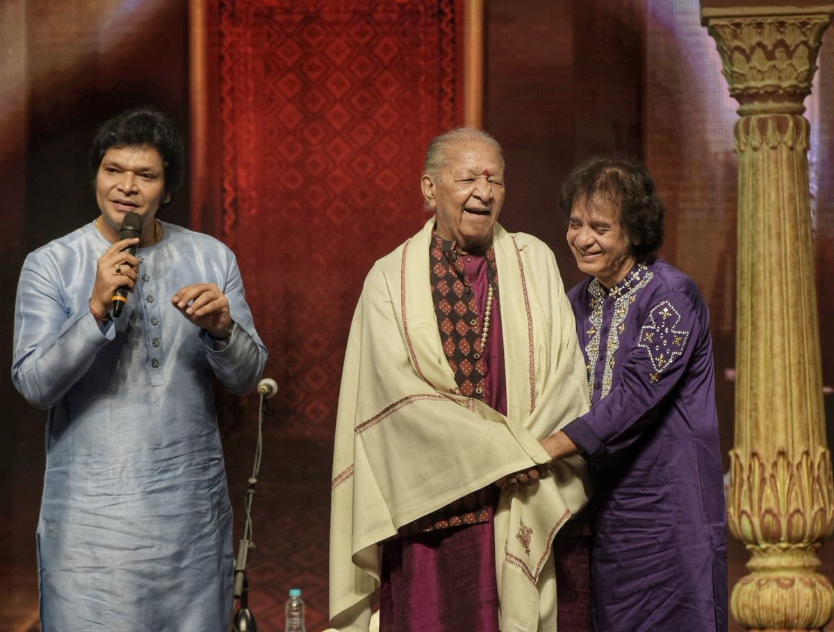 Rakeshflute's tweet photo. Last eve was like a dream come true for me. Sharing the stage with Ustad Zakir Hussain ji. What more could I have asked my Babuji (Pt Hariprasad Chaurasia Ji) was present there to release our Album “Zara” which is my first album with Ustaad Ji .Thanks to everyone present there🙏 https://t.co/mkCF9pLyPx