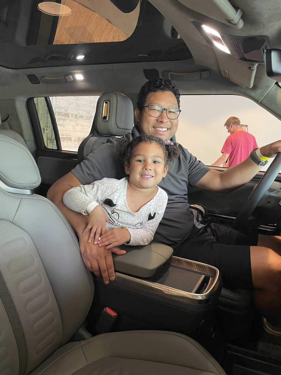 mingtai's tweet photo. In Boston, finally got to see the @Rivian R1S in action today with my favorite vehicle companion and critic.  It got her approval as she was able to see outside the windows easily and enjoyed her test ride. https://t.co/5Okzj0vkno