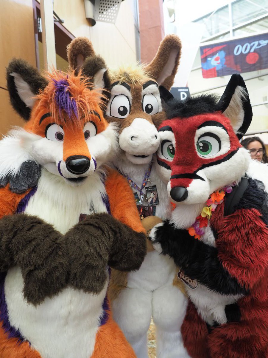 WineRedFox's tweet photo. Just suiting with some of my favorite fuzzies @Vaos_Porpoise and @klikyote at #AWU2023.

Photo taken by @overzen https://t.co/3pFzCN852I