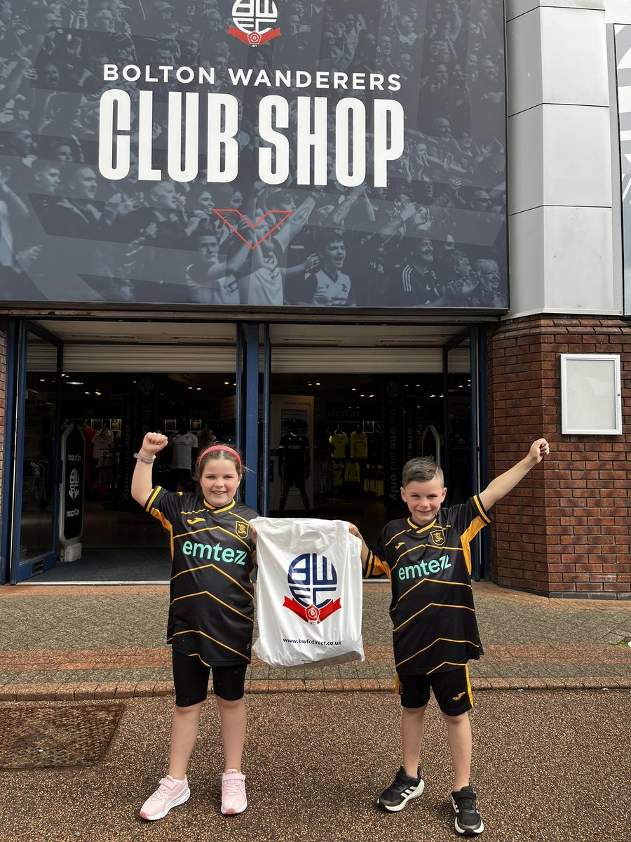 g17scott's tweet photo. First stop of the Summer holiday; pilgrimage to the Toughsheet Community Stadium and a visit to the @OfficialBWFC club shop! J&amp;S showing the new @LiviFCOfficial colours proudly!! 💪🏼🦁😍 https://t.co/ofcO4VbTD7