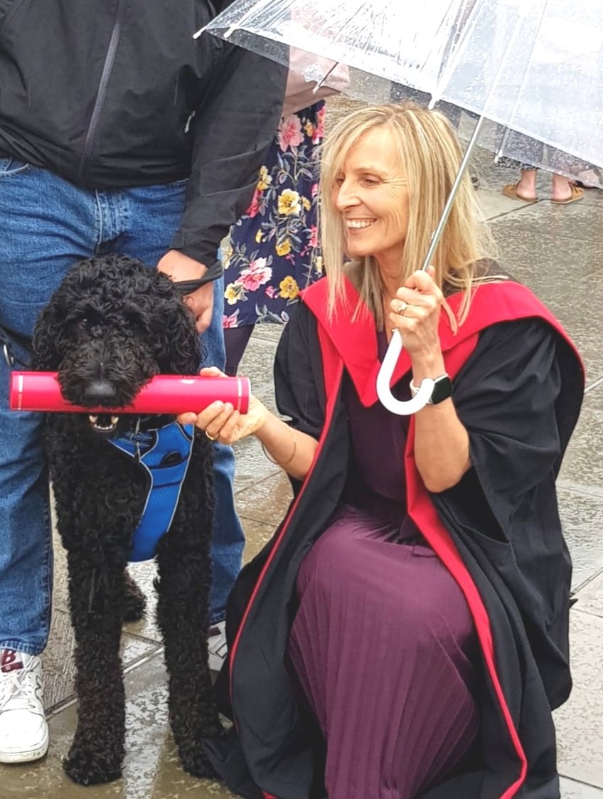 JillSteel's tweet photo. Wet PhD Graduation Day! @MorayHouse @UoELiteracyLab @EdinburghUni  Archie took part in my research - it was only right that he got a chew of my scroll! https://t.co/reEfJPk4UU
