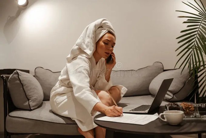 Sitting at my kitchen counter with my laptop &amp; phone, wearing my red robe, tracking my protein, drinking