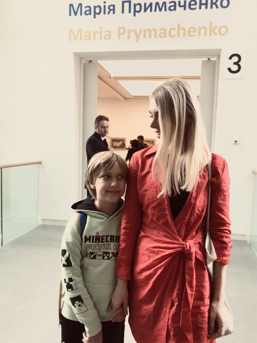 BBC_Olga_M's tweet photo. Enchanting art from my childhood - Maria Prymachenko's 'naïve' mythical creatures embody the essence of Ukrainian folk art. Thrilled to witness her legendary artworks in London and share them with my son. #LondonArt #Ukraine #Prymachenko @saatchi_gallery https://t.co/yxVQvXF8FO