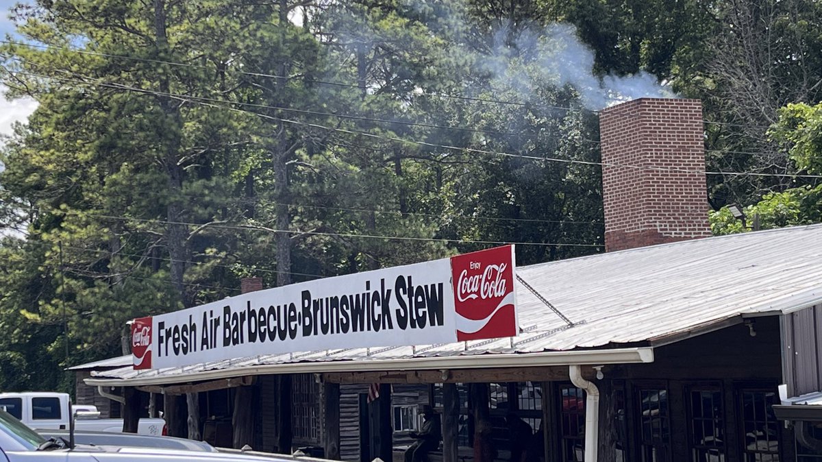 JMichaelBrewer's tweet photo. Camp Meeting and smoke rising from the pit at Fresh Air Barbecue. This is summer in #Georgia #IndianSprings #ButtsCounty https://t.co/dEZBZwGXKU