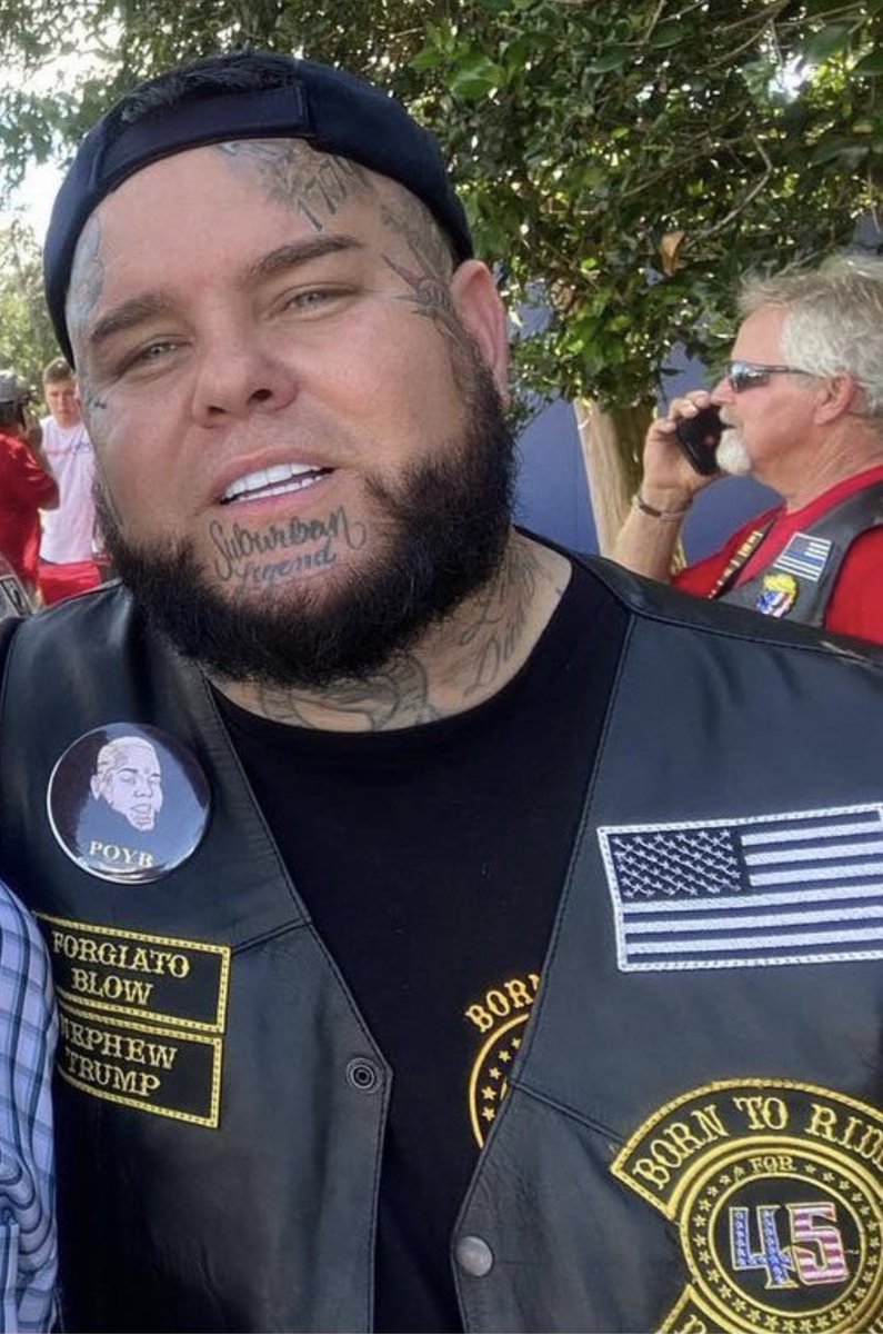 RT @patriottakes: Marjorie Taylor Greene’s rapper wearing a Proud Boys pin and shirt. https://t.co/0AzlseeDZ3