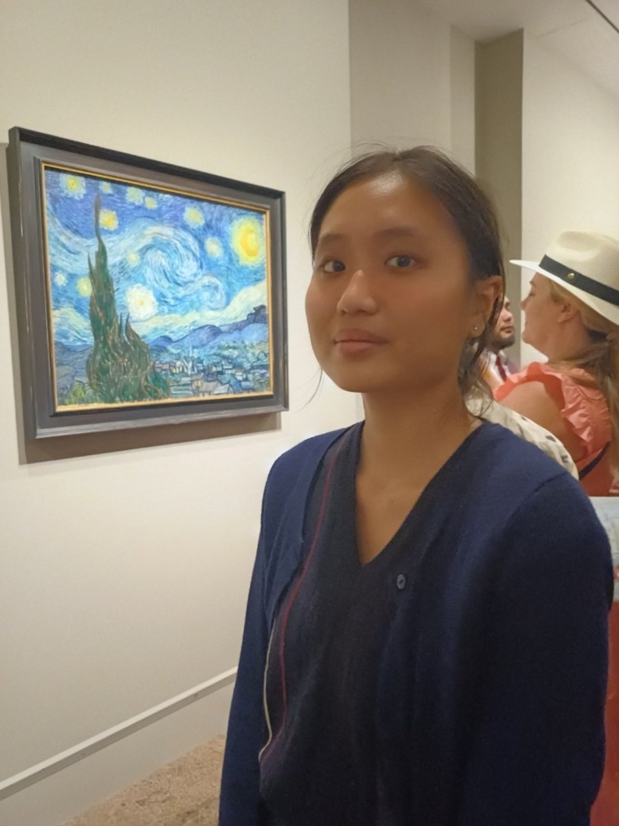 Me with van Gogh's The Starry Night in the background. 