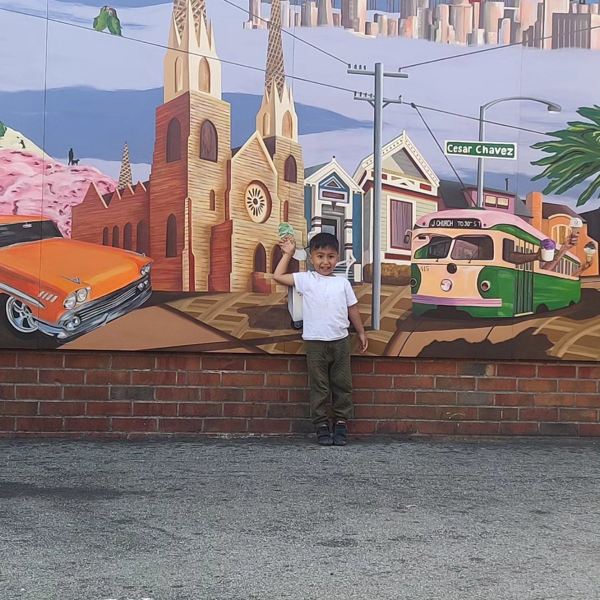nakman14's tweet photo. When that new Mitchell's Ice Cream mural, also features the #JChurch. 🔥 @SFMTA_Muni https://t.co/1z9hVxP63J