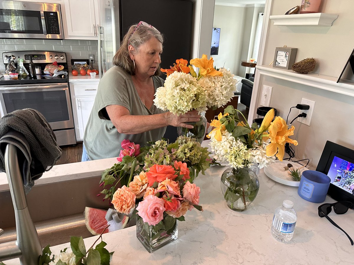 Arranging flowers from the garden of <a href="/jmccoygcs/">Jeff McCoy</a> for <a href="/gcssummeracad/">GCS Summer Academy</a> ! We can’t wait to see you this week July 17-20! #gcssi23 #summeracademy2023 #greenvillecountyschools