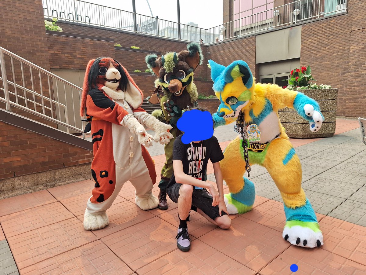 Got a picture with some fursuiters at animethon!
