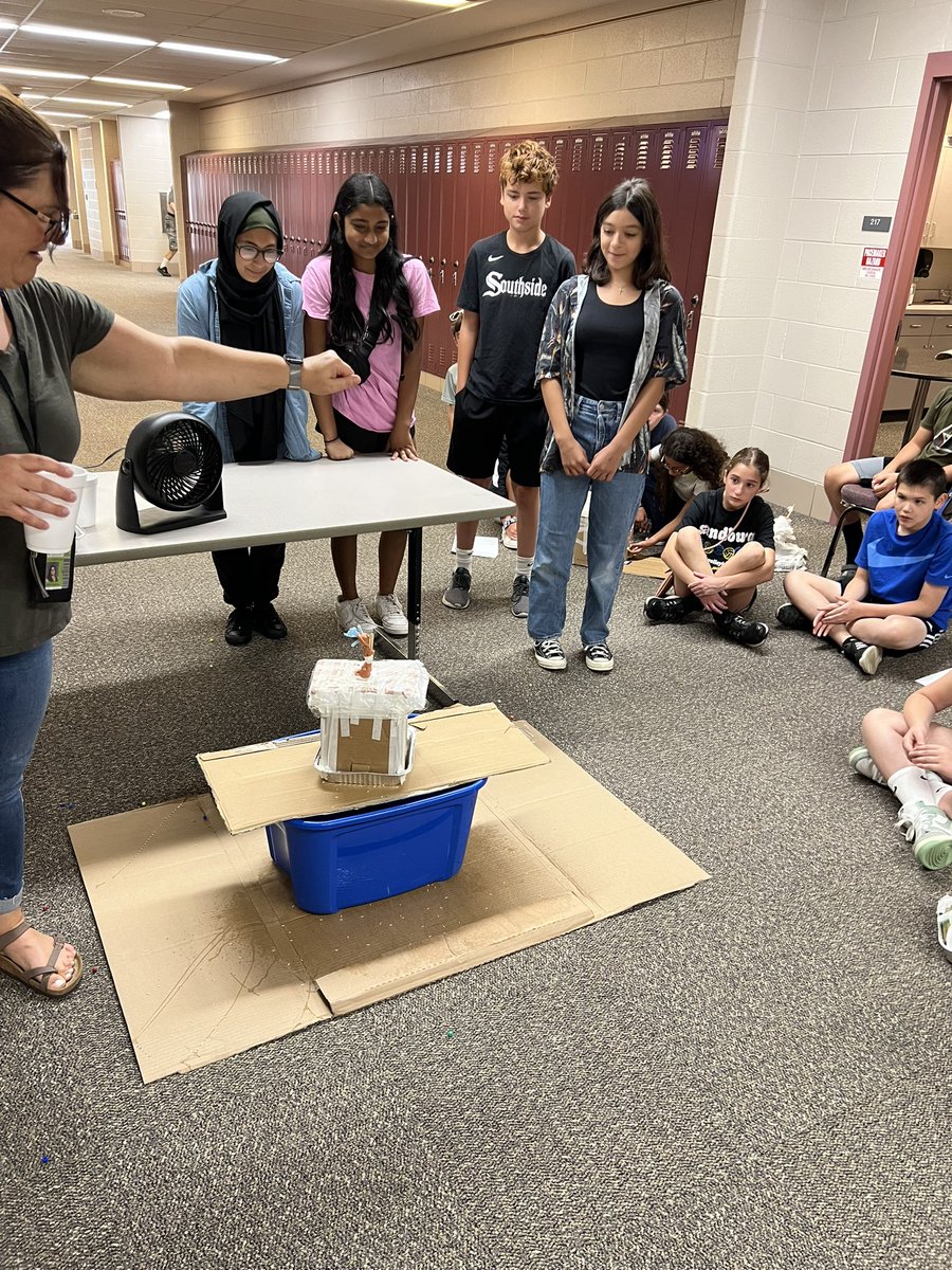 iCoachGabi's tweet photo. One of the best ways to encourage collaborative learning is through STEM challenges. We had a blast testing our houses against the “weather”! These leaders were so innovative in their planning &amp; problem solving #edtechusf675 https://t.co/n1dRbKm1qi