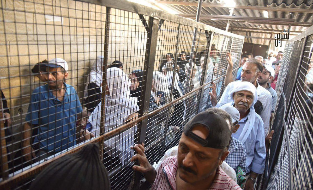FARED_ALHOR's tweet photo. People are waiting for their turn inside iron cages to get "bread" in the Syrian capital, Damascus.

This is what Assad brought to Syria and the Syrians after fifty years of ruling Syria. https://t.co/GjlbqFIURZ