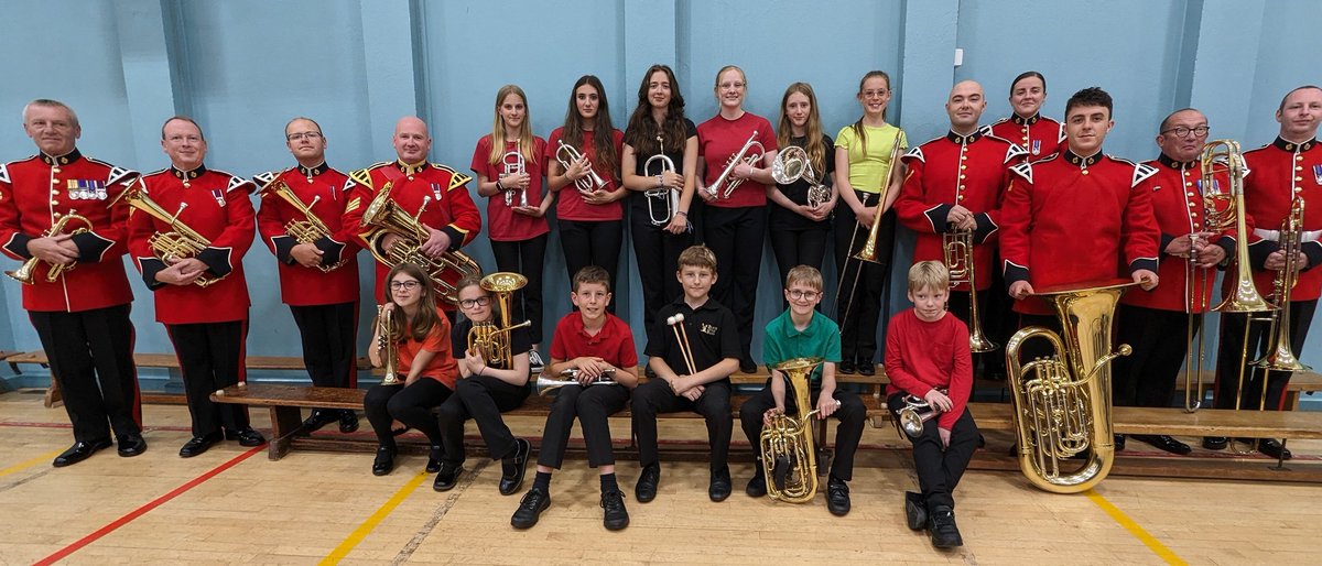Members of our youth band with The Prince of Wales Army Band at their concert with <a href="/TheCYBB/">Cornwall Youth Band</a>