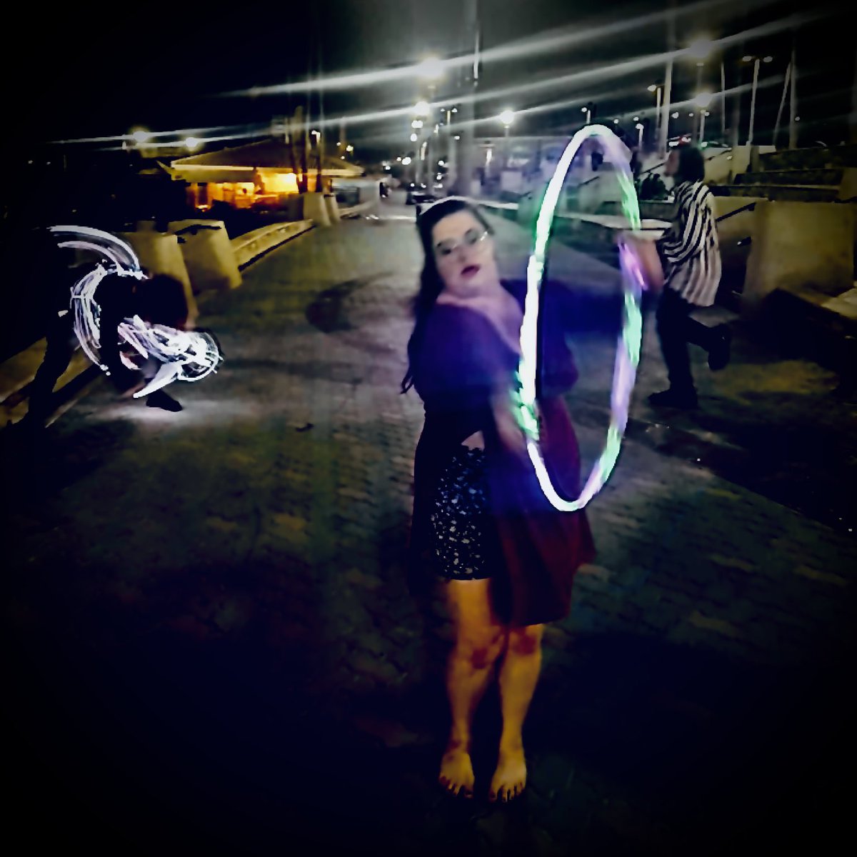 Emc4life29's tweet photo. Tanka: Hoops flow 

To life’s sweet rhythm we cling 
In this dance without an end
Glowing hoop a siren’s ring
Shadows and lights blend
In its orbit dancers sing

#hoopdance
#flowarts
#flow
#poetry
#tanka
#hoopflow https://t.co/LACmwDB3tG