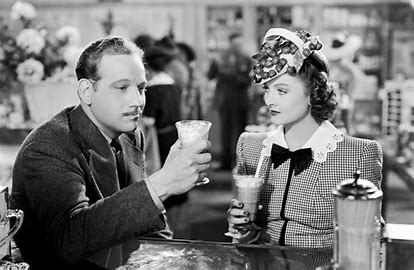 CYoung25fd8h's tweet photo. #NowWatching #ThirdFingerLeftHand Amusing screwball about mag editor Myrna who has to produce her mythical husband. Artist Melvyn fills the bill. Good cast. Fun, if not tip-toppermost among screwballs. And Myrna wears a favorite screwball hat - a basket of cherries. #TCMParty https://t.co/SnJfVnag13