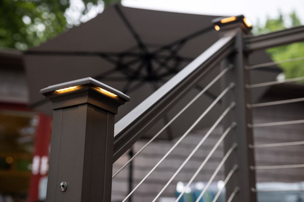 This deck on Lake Michigan features beautiful horizontal cable railing to maximize lake views and uses textured bronze to fit with the home's architectural colors. And of course there's lighting for relaxing evenings near the water!

hubs.ly/Q01XWHXV0