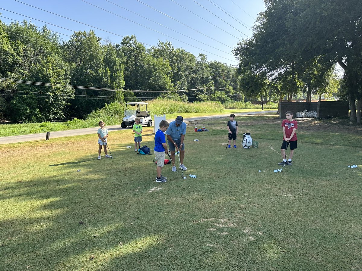 Iron Horse Golf and Tennis Camp is underway. Plenty of excited young golfers and tennis players practicing their games.
