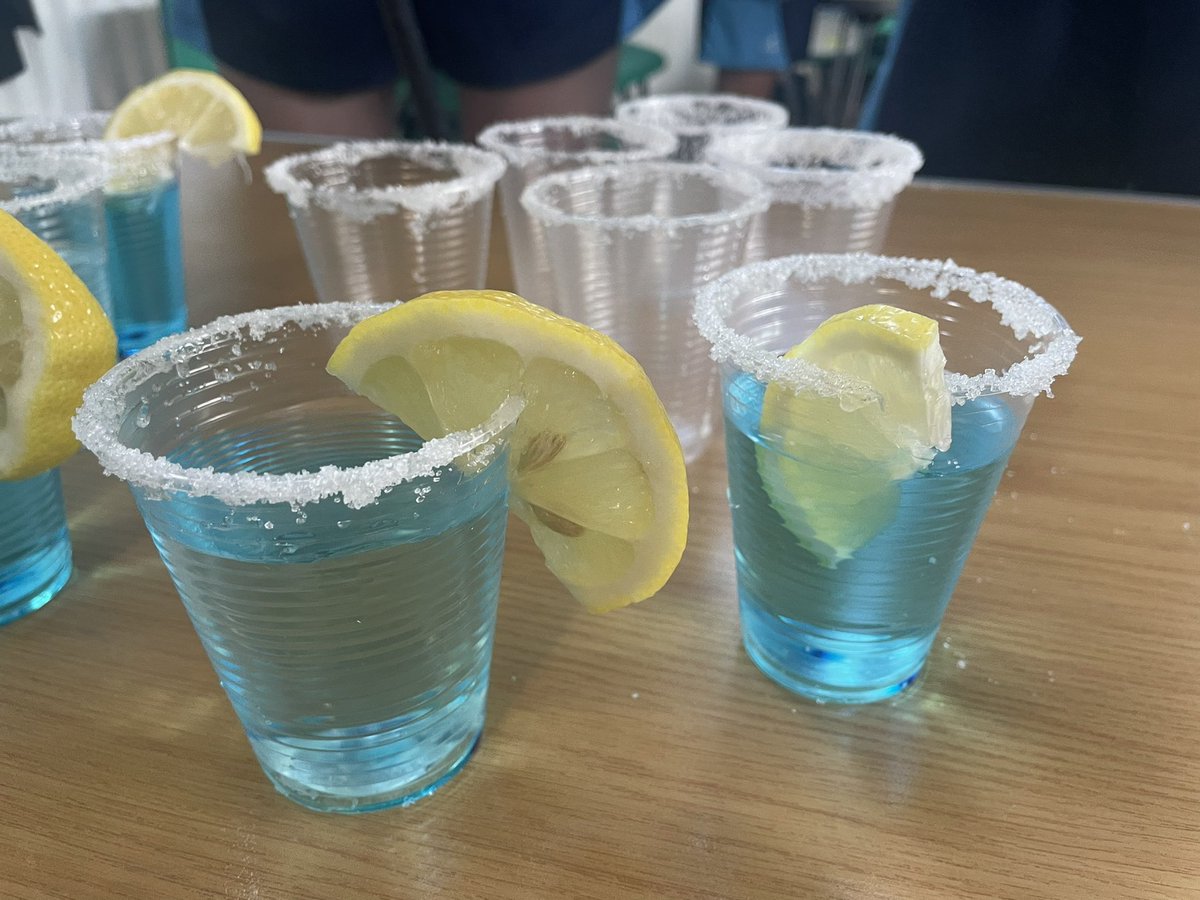 Other half of the year group doing a business game creating their own lemonade.