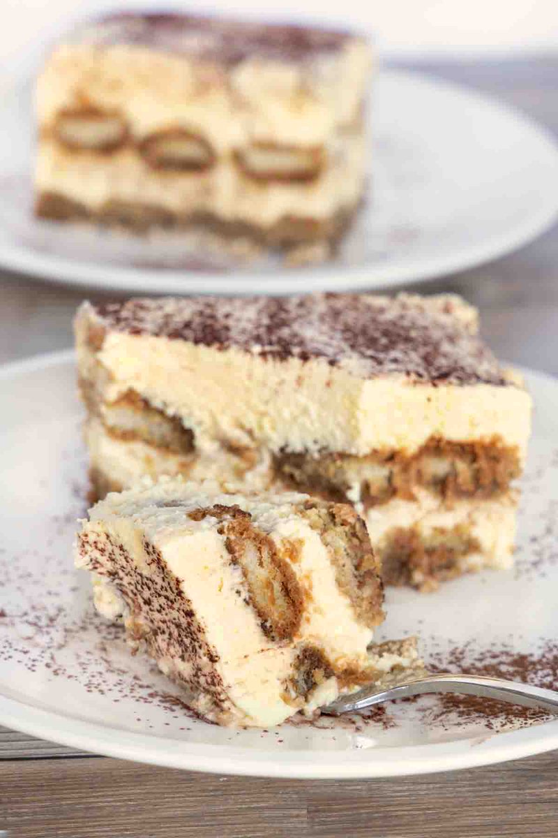 My easy-to-make and amazingly delicious Tiramisu recipe is made with coffee-soaked ladyfingers, creamy mascarpone, homemade whipped cream and dusted with cocoa powder for the perfect finish on this classic Italian dessert. #dessert #recipes Printable Recipe->…