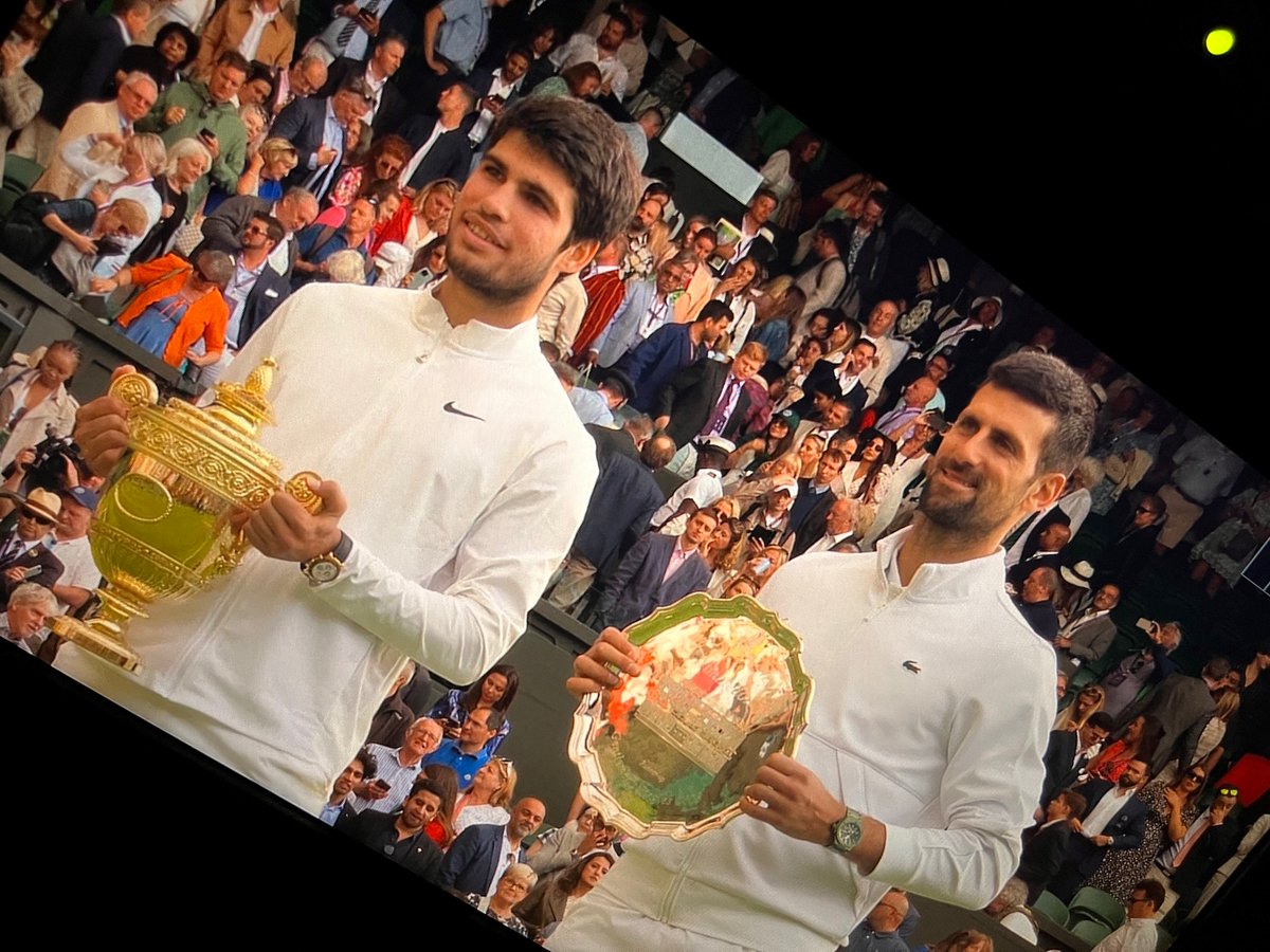 SpectraTVAndrew's tweet photo. Windy Wimbledon - Novak Djokovic's wining streak comes to an end. https://t.co/E64tGGs4xl