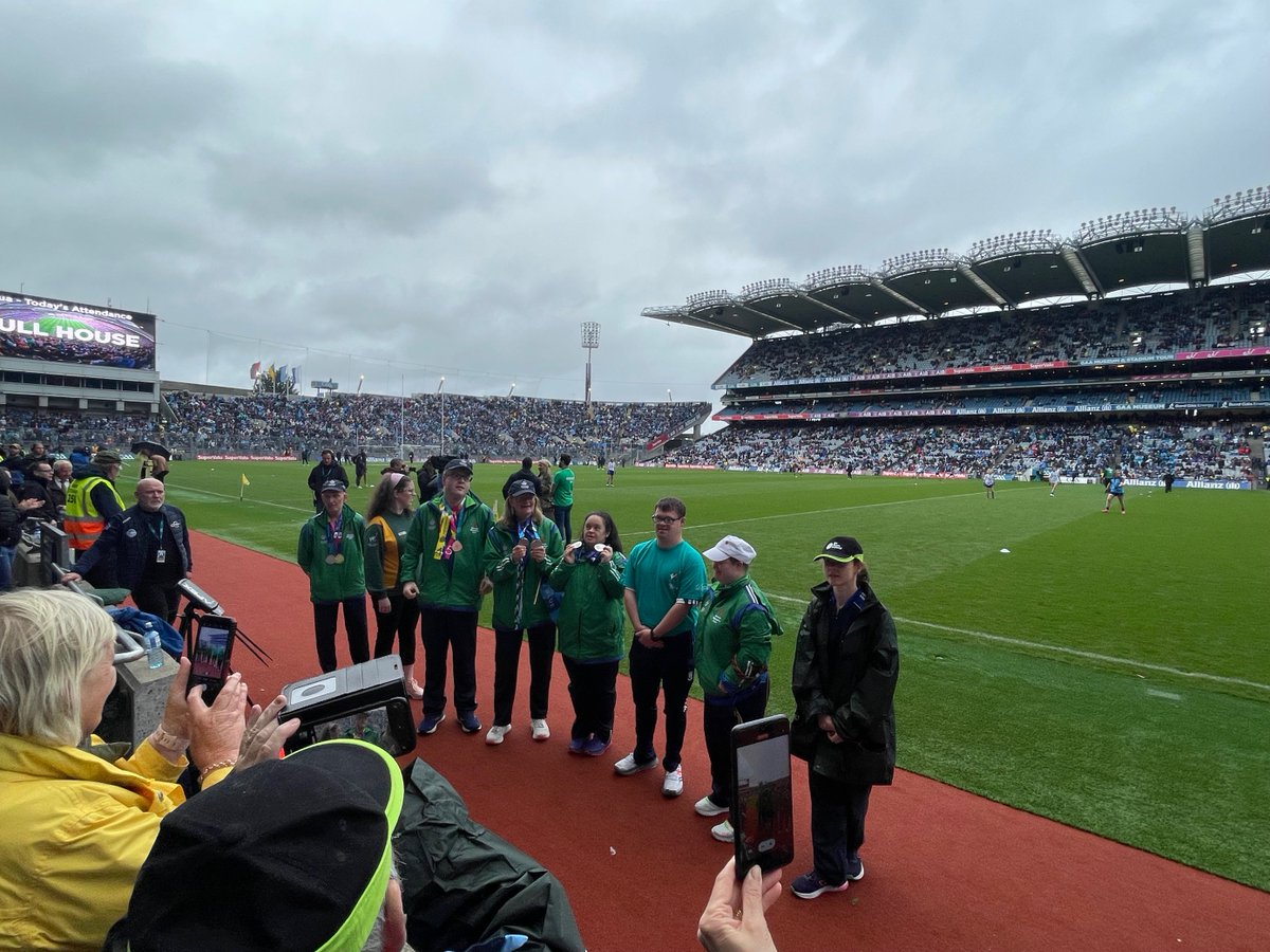 SOIreland's tweet photo. Team Ireland athletes from 2003 and 2023 Special Olympics World Games presented to the crowd on the pitch at the Dublin v Monaghan semifinal in @CrokePark! A fantastic day was had by all; thanks to @officialgaa for making it possible. https://t.co/955V0E3T7F