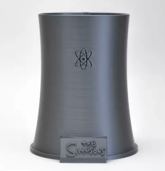 Threeding's tweet image. Bring a piece of Springfield to your home or office with this incredible desk accessory. 🌬️ Use it as a pencil cup or cooler and enjoy the iconic cooling towers from the Springfield Nuclear Power Plant. Perfect for fans of The Simpsons! #Simpsons #3DPrintedModel #DeskAccessory