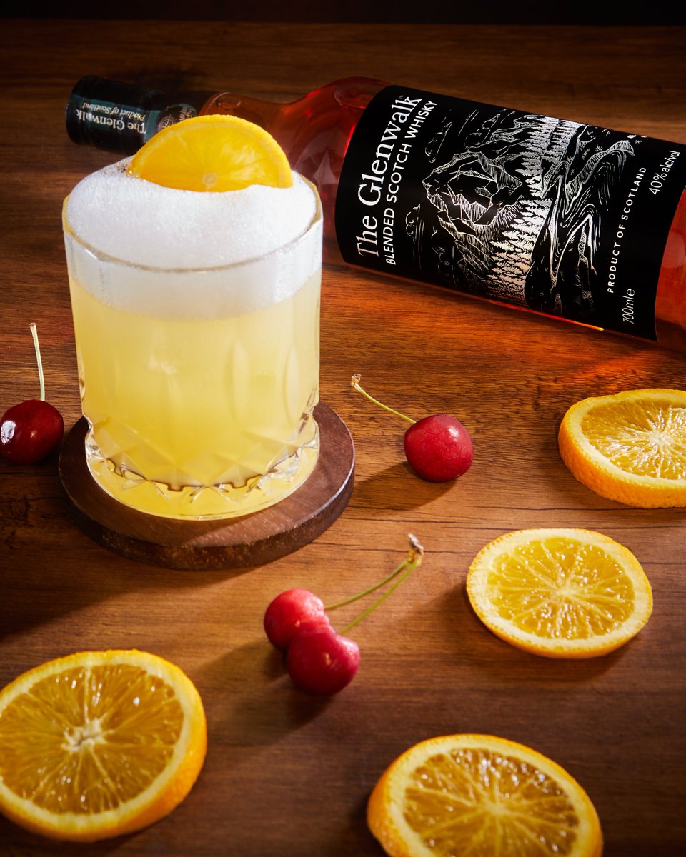 Crafting the perfect Whisky Sour with Glenwalk Scotch, accentuated by zesty lemons and crowned with a cherry. #SanjayDutt #TheGlenwalkWhisky #TheProductOfScotland #ForgeYourOwnPath #Whisky #Scotch #Scotland